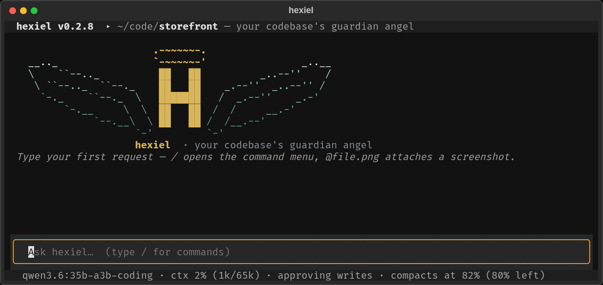 hexiel's terminal welcome screen with the angel-wings logo